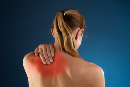 Alexander Technique helps back pain - picture of woman rubbing back